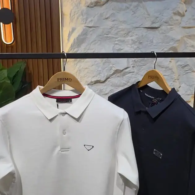 Polo blanc col V — Logo brodé